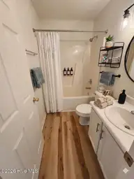 243 Parnell Road, Hubert, NC 28539 — 3-bedroom home in Foxtrace, Hubert, NC, photo 21 of 26: Hall Bath AI Staged