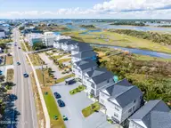 825a N New River Drive, Surf City, NC 28445 — 4-bedroom waterfront townhome, Surf City, NC, photo 9 of 49: 034_dji_20261001115853_0100_dp_41