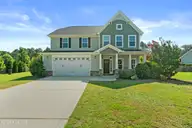 418 Goldenleaf Circle, Whispering Pines, NC 28327 — 4-bedroom home in Summerfield at Arrowstone, Whispering Pines, NC, photo 2 of 47: Front of House