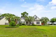 4809 W Grove Drive, Wilmington, NC 28409 — 4-bedroom home in Masonboro Woods, Wilmington, NC, photo 1 of 40: Front Exterior (4)
