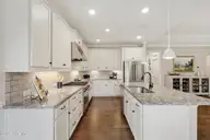 3014 Pine Bloom Way, Leland, NC 28451 — 4-bedroom home in Brunswick Forest, Leland, NC, photo 15 of 69: Under cabinet lighting
