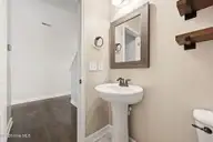 120 Mittams Point Drive, Jacksonville, NC 28546 — 4-bedroom home in Towne Pointe, Jacksonville, NC, photo 23 of 55: Half-bath downstairs
