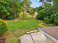 4503 W Fairway Drive, Trent Woods, NC 28562 — 4-bedroom home in Greenwood, Trent Woods, NC, photo 12 of 37: Back
