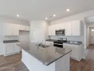 521 Sanderling Court Lot 350, Sneads Ferry, NC 28460 — 5-bedroom home in The Preserve at Tidewater, Sneads Ferry, NC, photo 11 of 37: Centerway25254kitDRHortonL33A2-019-037-1