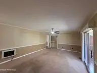 205 Miller Street, Chadbourn, NC 28431 — 3-bedroom home, Chadbourn, NC, photo 12 of 40: Back Living Room