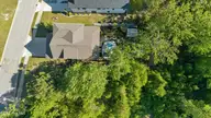 352 Summerhouse Drive, Holly Ridge, NC 28445 — 4-bedroom waterfront home in Summerhouse On Everett Bay, Holly Ridge, NC, photo 4 of 80: 70_dji_20260421162934_0068_d