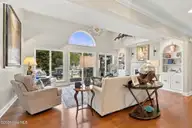 152 Arborvitae Drive, Pine Knoll Shores, NC 28512 — 3-bedroom waterfront home in Pine Knoll Association, Pine Knoll Shores, NC, photo 12 of 61: Living Room