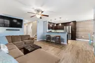 117 NE 19th Street, Oak Island, NC 28465 — 3-bedroom home in Tranquil Harbor, Oak Island, NC, photo 11 of 77: Kitchen Bar