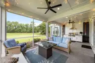 222 Twining Rose Lane, Holly Ridge, NC 28445 — 4-bedroom waterfront home in Summerhouse On Everett Bay, Holly Ridge, NC, photo 18 of 62: Outdoor Living Area