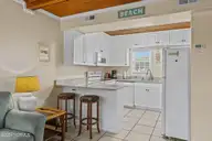 103 24th Street, Emerald Isle, NC 28594 — 4-bedroom townhome in Emerald Isle By The Sea, Emerald Isle, NC, photo 6 of 51: Kitchen