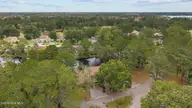 84 Quarterdeck Townes, New Bern, NC 28562 — 3-bedroom waterfront townhome in River Bend, New Bern, NC, photo 13 of 46: 9-web-or-mls-DJI_20251014111104_0531_D