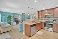 129 NE 13th Street, Oak Island, NC 28465 — 3-bedroom home, Oak Island, NC, photo 11 of 68: Kitchen/Living Room
