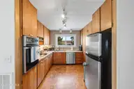402 Dolphin Street, Sunset Beach, NC 28468 — 3-bedroom waterfront home, Sunset Beach, NC, photo 23 of 53: Kitchen Area
