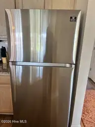 330 S Middleton Drive NW Unit 505, Calabash, NC 28467 — 2-bedroom waterfront condo in Brunswick Plantation, Calabash, NC, photo 12 of 72: 505 stainless steel refrigerator