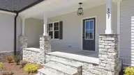 307 Coffman Drive Lot 130, Pikeville, NC 27863 — 3-bedroom home in Glenn Laurel, Pikeville, NC, photo 5 of 53: 9-web-or-mls-dji_20260421130945_0231_d