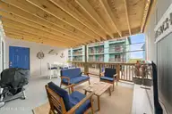 505 N Carolina Beach Avenue Unit 1c, Carolina Beach, NC 28428 — 2-bedroom waterfront condo in Winds at Carolina Beach, Carolina Beach, NC, photo 1 of 44: Porch 1