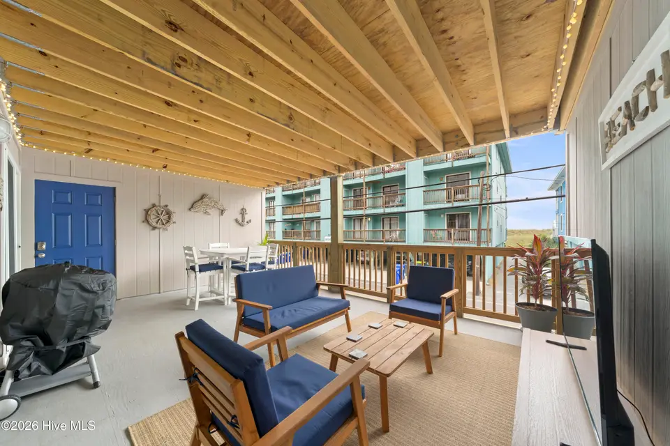 505 N Carolina Beach Avenue Unit 1c, Carolina Beach, NC 28428 — 2-bedroom waterfront condo in Winds at Carolina Beach, Carolina Beach, NC, photo 1 of 44: Porch 1