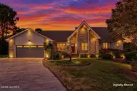 106 Bogey Court, Hampstead, NC 28443 — 4-bedroom home in Belvedere, Hampstead, NC, photo 1 of 52: 106BogeyCourt-1-Dusk