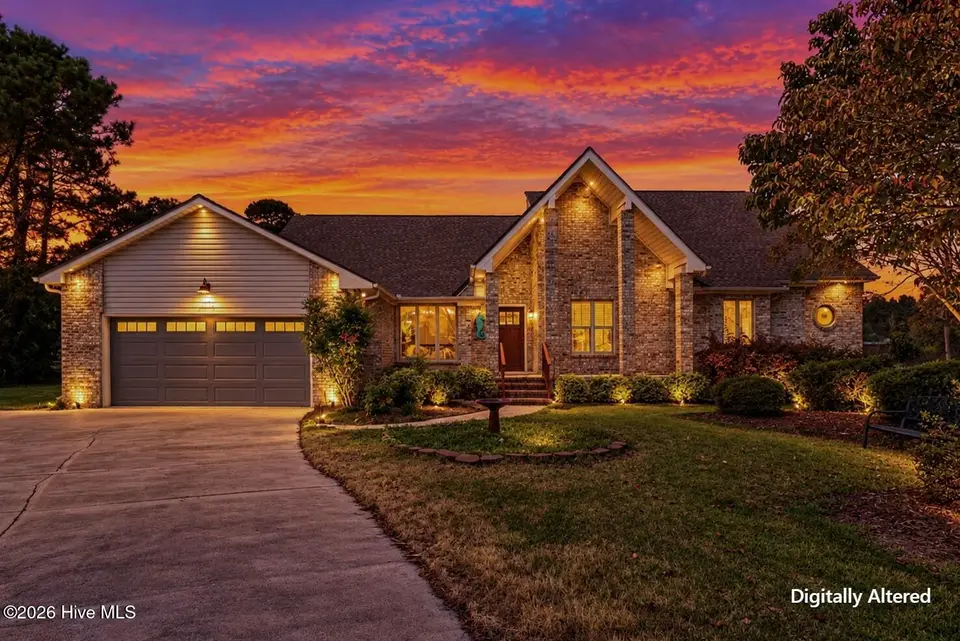 106 Bogey Court, Hampstead, NC 28443 — 4-bedroom home in Belvedere, Hampstead, NC, photo 1 of 52: 106BogeyCourt-1-Dusk