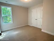 100 S Bandwheel Way, Hampstead, NC 28443 — 3-bedroom home in Sawyers Run, Hampstead, NC, photo 13 of 20: Bedroom 3