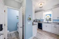 2201 E Beach Drive, Oak Island, NC 28465 — 5-bedroom waterfront home in East Beach, Oak Island, NC, photo 10 of 38