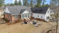 3506 Denim Court, New Bern, NC 28562 — 4-bedroom home in Carolina Colours, New Bern, NC, photo 4 of 64: 7-web-or-mls-DJI_20260310152718_0870_D