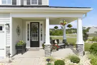 24 W Abaco Way, Hampstead, NC 28443 — 4-bedroom home in Sanctuary at Forest Sound, Hampstead, NC, photo 3 of 63: Front Porch