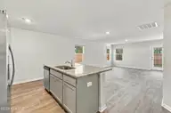 5256 Soybean Drive NE, Winnabow, NC 28479 — 3-bedroom home in Country Walk, Winnabow, NC, photo 17 of 43: 20_kitchen & living area