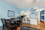 1311 Lake Park Boulevard S 2b, Carolina Beach, NC 28428 — 1-bedroom waterfront condo in Sea Colony, Carolina Beach, NC, photo 10 of 42: Dining Room