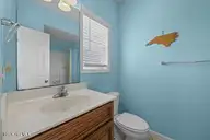 113 Anchor Drive A, Surf City, NC 28445 — 5-bedroom waterfront townhome in Topsail Cove, Surf City, NC, photo 24 of 62: thumbnail-019d06a6-f2aa-712b-b7ae-276bb0