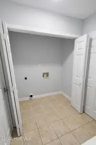 1941 Rolling Ridge Drive, Midway Park, NC 28544 — 2-bedroom townhome in Hunters Creek, Midway Park, NC, photo 10 of 14: laundry closet