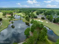 1141 Greensview Circle, Leland, NC 28451 — 2-bedroom townhome in Magnolia Greens, Leland, NC, photo 23 of 30: DroneGolf