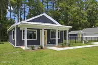 157 Long Pond Loop, Swansboro, NC 28584 — 2-bedroom waterfront condo in Cabins at Old Horse, Swansboro, NC, photo 3 of 28: Exterior Front View 2