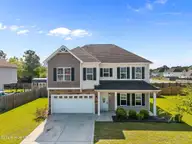 104 Stonewater Lane, Jacksonville, NC 28546 — 4-bedroom home in Hunters Creek, Jacksonville, NC, photo 1 of 37: 1-web-or-mls-104 Stonewater Ln 91