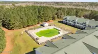 490 Little River Farm Boulevard 101a, Carthage, NC 28327 — 2-bedroom condo in Little River Fa, Carthage, NC, photo 19 of 19: Drone Little River Condo Pool