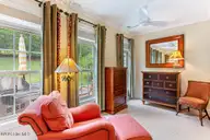 140 Shadow Creek Court, Pinehurst, NC 28374 — 2-bedroom townhome in Villas at Forest Hills, Pinehurst, NC, photo 19 of 39: Primary Bedroom-sitting area