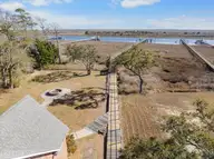 715 Shoreline Drive W, Sunset Beach, NC 28468 — 5-bedroom waterfront home, Sunset Beach, NC, photo 2 of 75: 715ShorelineDr-3
