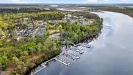 615 Jenoa Drive, Castle Hayne, NC 28429 — 4-bedroom townhome in River Bluffs, Castle Hayne, NC, photo 4 of 50: 51_dji_20250401132840_0031_d