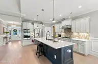 210 Knots Bend Drive, Hampstead, NC 28443 — 4-bedroom home in Salters Haven at Lea Marina, Hampstead, NC, photo 24 of 72: 40_foyer & kitchen