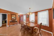 195 Calabash Road NW, Calabash, NC 28467 — 3-bedroom manufactured home in Carolina Shores, Calabash, NC, photo 9 of 37: Dining Area