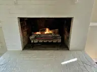 915 Sunset Boulevard, Newport, NC 28570 — 3-bedroom waterfront home in Sound View Park, Newport, NC, photo 11 of 55: Living Room Gas Fireplace