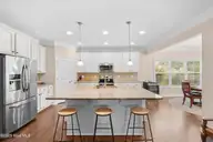 418 Goldenleaf Circle, Whispering Pines, NC 28327 — 4-bedroom home in Summerfield at Arrowstone, Whispering Pines, NC, photo 14 of 47: kitchen island