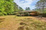 32 Bogie Drive, Whispering Pines, NC 28327 — 3-bedroom home in Whispering Pines, Whispering Pines, NC, photo 11 of 63: 12-16_32 Bogie Dr., WP_Exterior_Spring_L