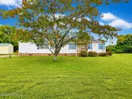 107 Bluebird Drive, Elizabeth City, NC 27909 — 3-bedroom manufactured home in Halls Creek Village, Elizabeth City, NC, photo 1 of 21