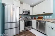 300 Sweetwater Cove, Newport, NC 28570 — 3-bedroom condo in The Coves at Newport, Newport, NC, photo 11 of 40: Kitchen View