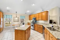 618 Oyster Bay Drive, Sunset Beach, NC 28468 — 3-bedroom home in Sea Trail Plantation, Sunset Beach, NC, photo 12 of 62: Gas cook top