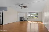 758 Wetherington Landing Road, Stella, NC 28582 — 3-bedroom manufactured home, Stella, NC, photo 10 of 49: Great room