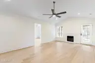 4930 N Hampton Drive SE, Southport, NC 28461 — 3-bedroom waterfront home in Carolina Place, Southport, NC, photo 18 of 58: Living room