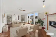 1074 Sea Gate Drive, Newport, NC 28570 — 3-bedroom waterfront home in Sea Gate, Newport, NC, photo 6 of 59: Virtually Staged Family Room