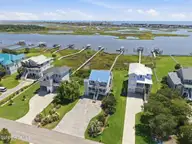 158 Big Hammock Point Road, Sneads Ferry, NC 28460 — 5-bedroom waterfront home in Pelican Point, Sneads Ferry, NC, photo 4 of 56